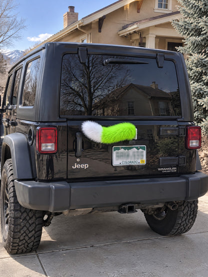 Neon Green & White | Wagride tail centered on the rear of a parked car